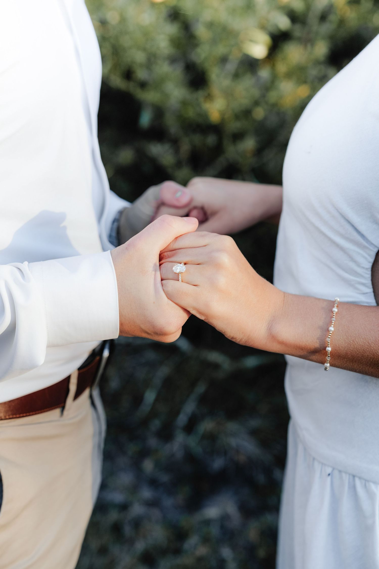 Engaged Couple Showing Engagement Ring in Louisiana