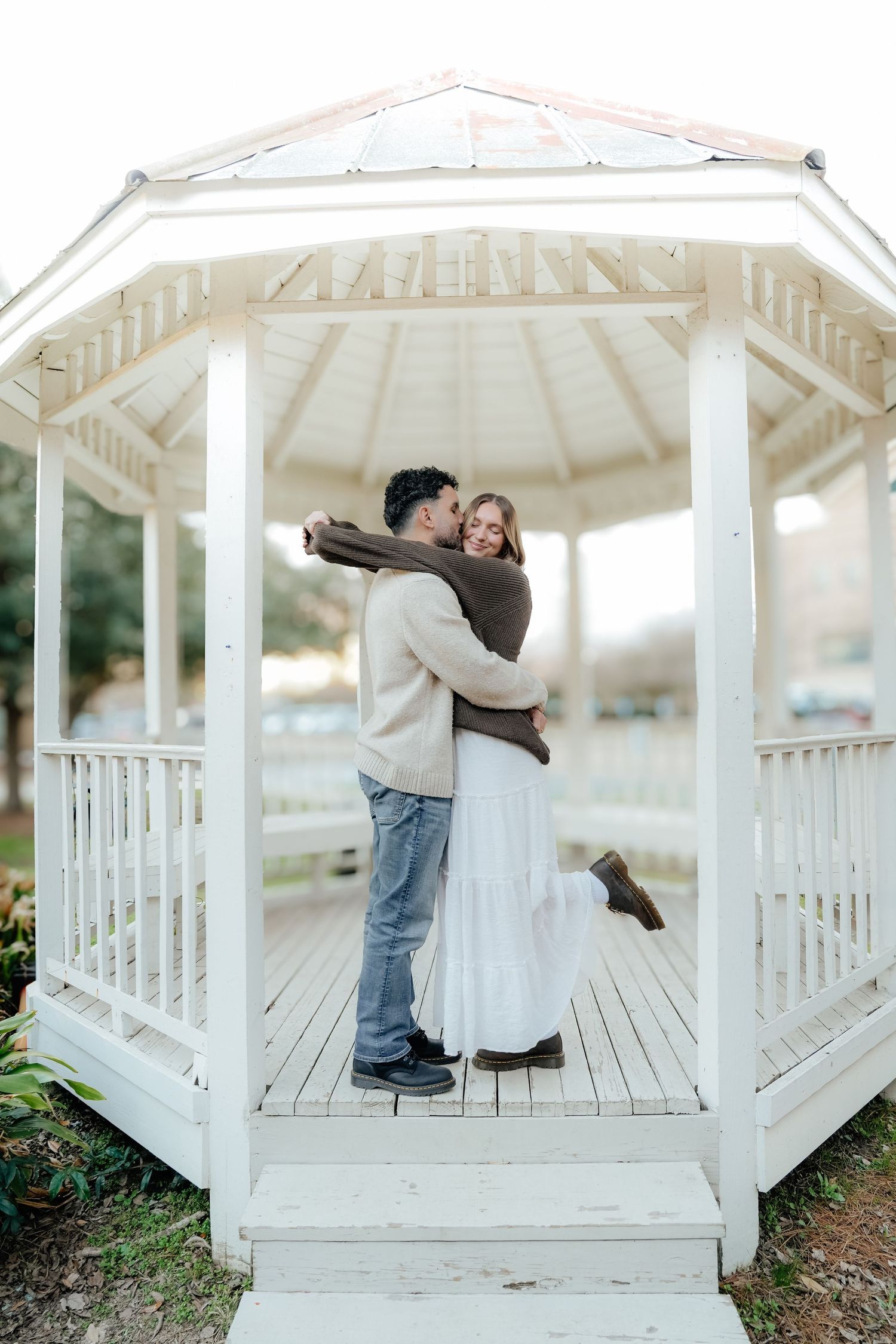 Couple Smiling at Each Other Under Pavilion in Louisiana