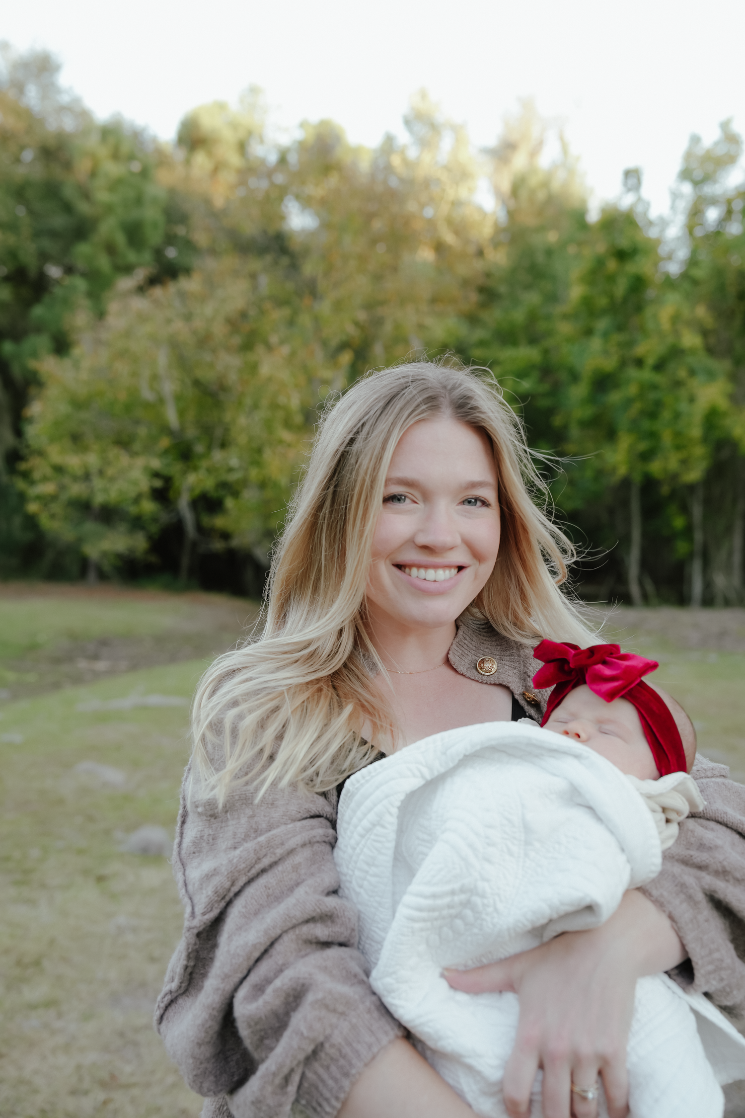Mom Holding Newborn Baby in Louisiana