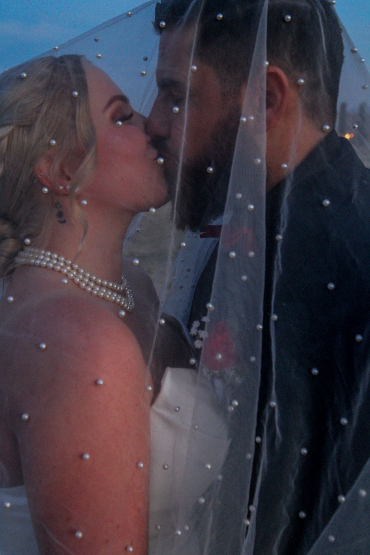 kissing under the veil
Kern County Photography
Tori Marie Photos
California Wedding Photographer