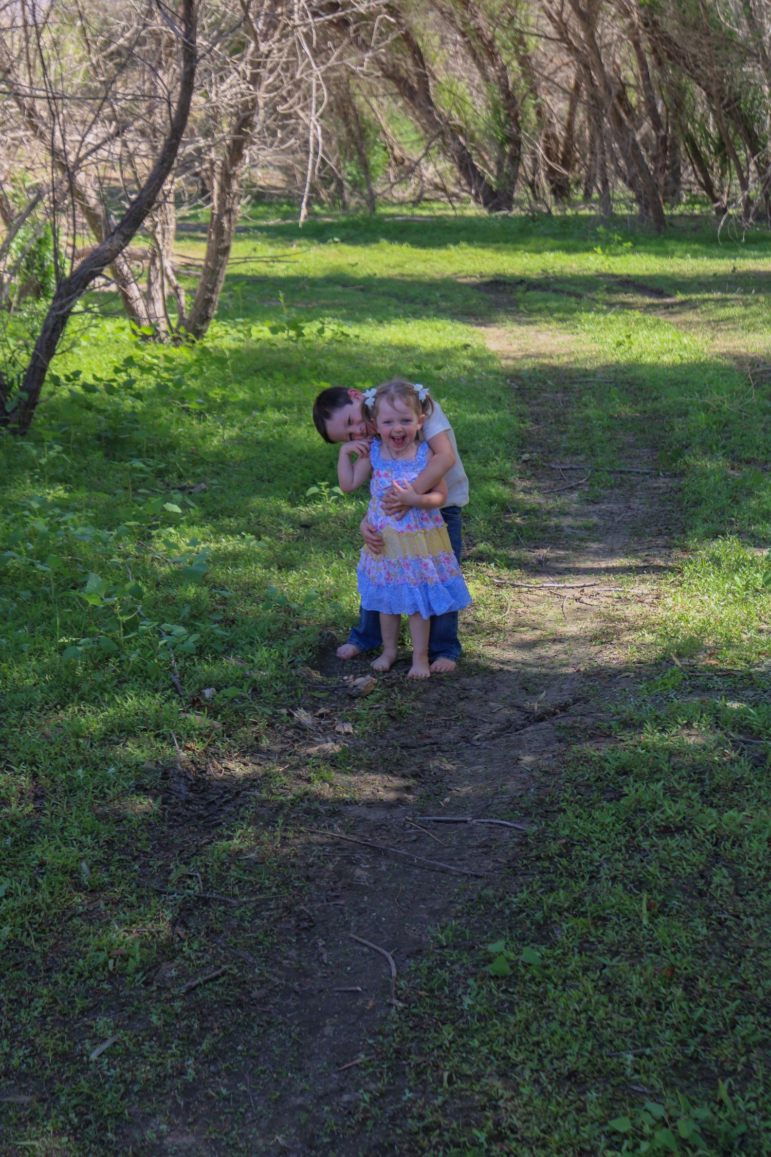 brother giving sissy a hug from behind
Kern County Photography
Tori Marie Photos
Family Photographer