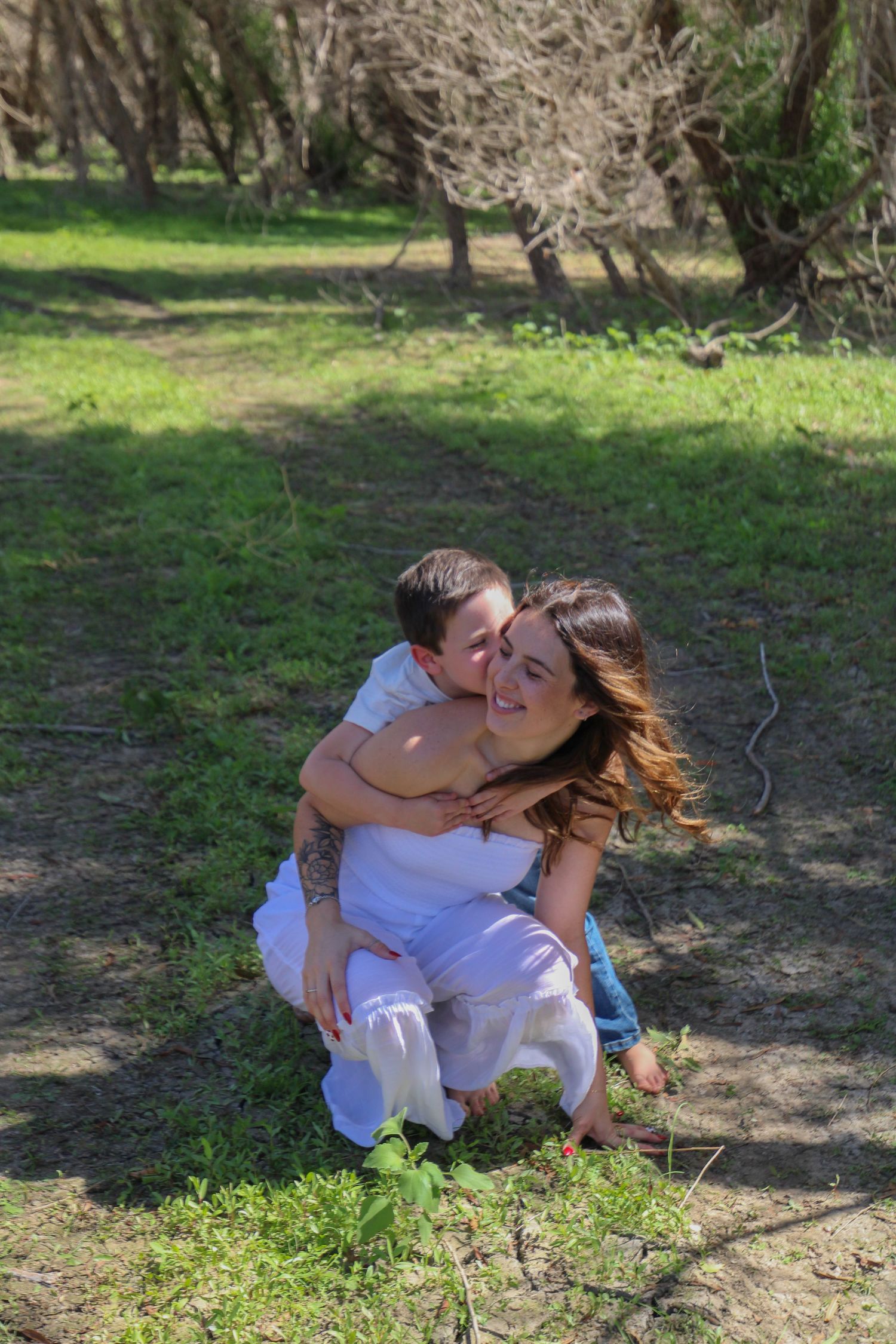 son kissing mommy on the cheek
Kern County Photography
Tori Marie Photos
Family Photographer