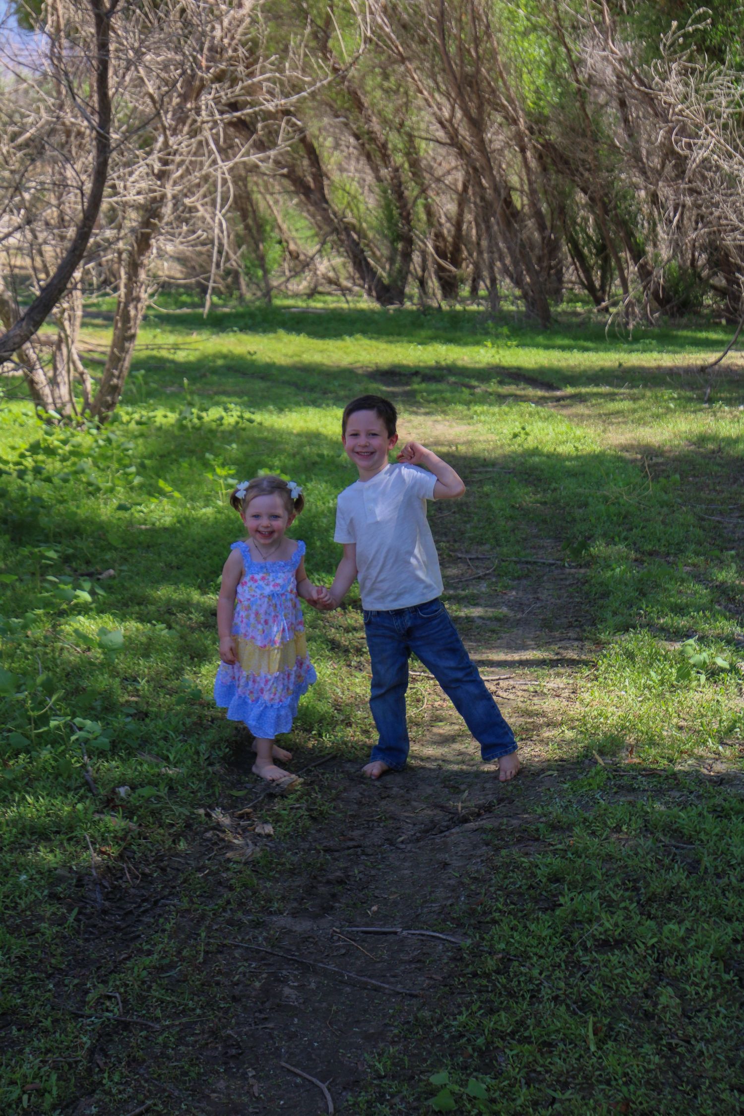 brother showing his muscles to sissy
Kern County Photography
Tori Marie Photos
Family Photographer