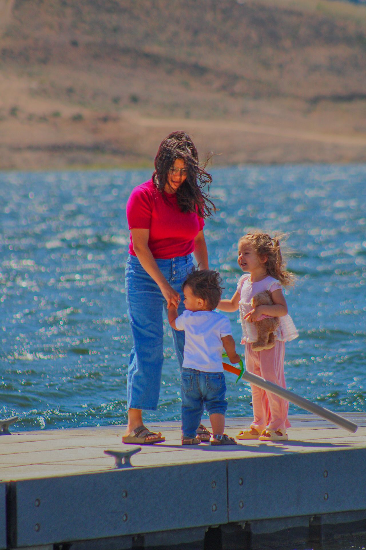 Tori Marie Photos
family playing on the doc, heavier editing
Kern county photography 
Family photography 
candid family photoshoot
