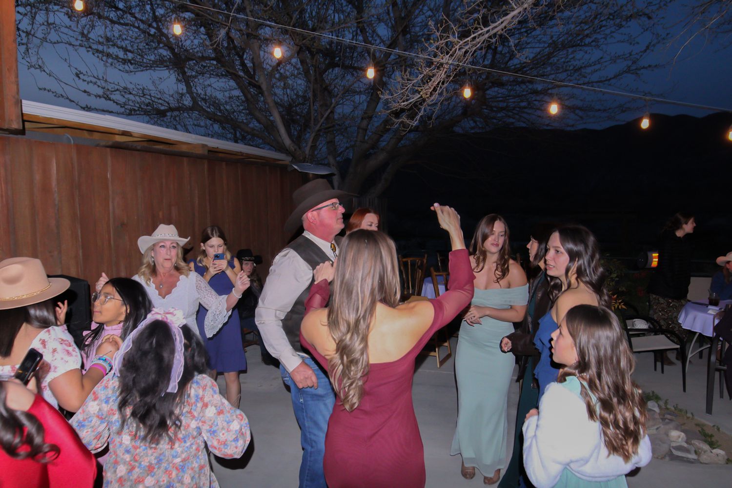 groom dancing with brides family
Kern County Photography
Tori Marie Photos
California Wedding Photographer