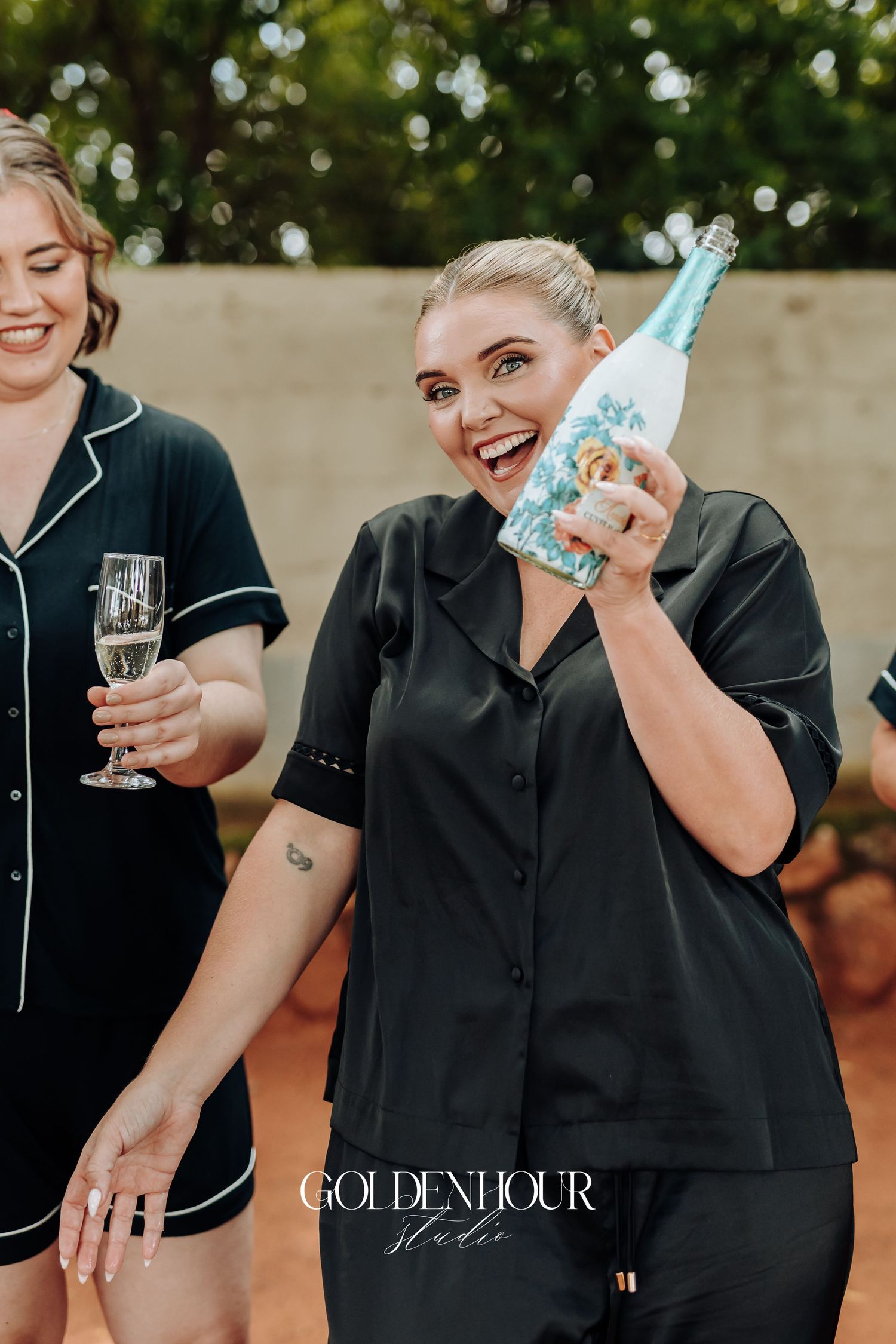 A series of photos showing someone in a black button-down shirt laughing and drinking from a bottle.