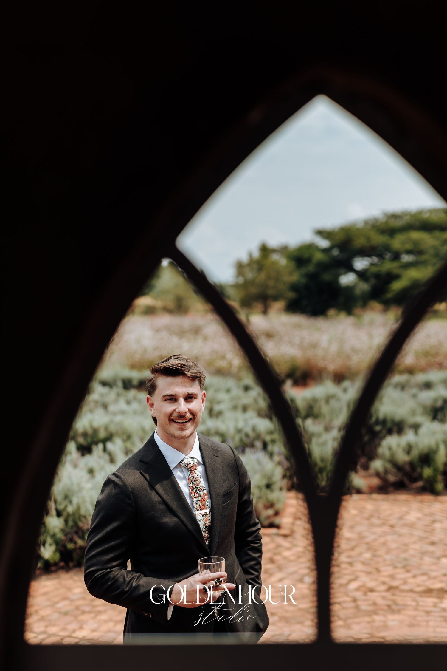 Scenic desert landscape view through arched architectural frames.