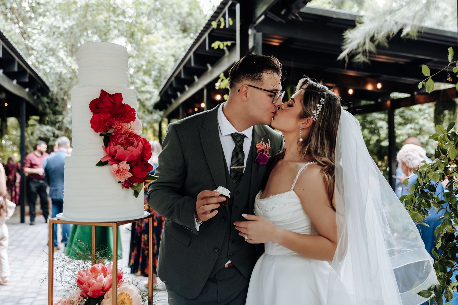 A romantic wedding ceremony montage showing couples exchanging vows and kisses under floral decorations.