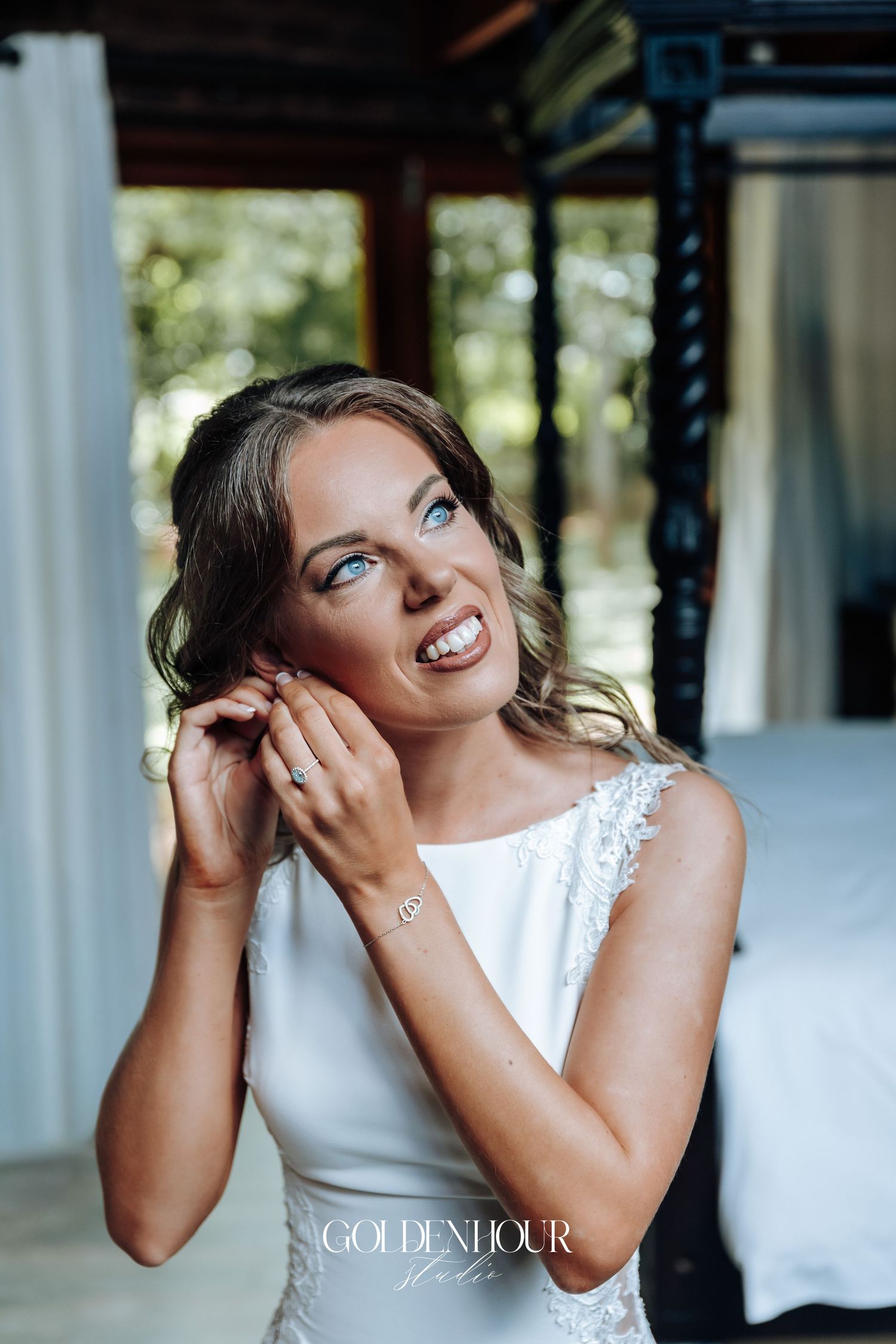 Joyful expressions and laughter during wedding celebration indoors.