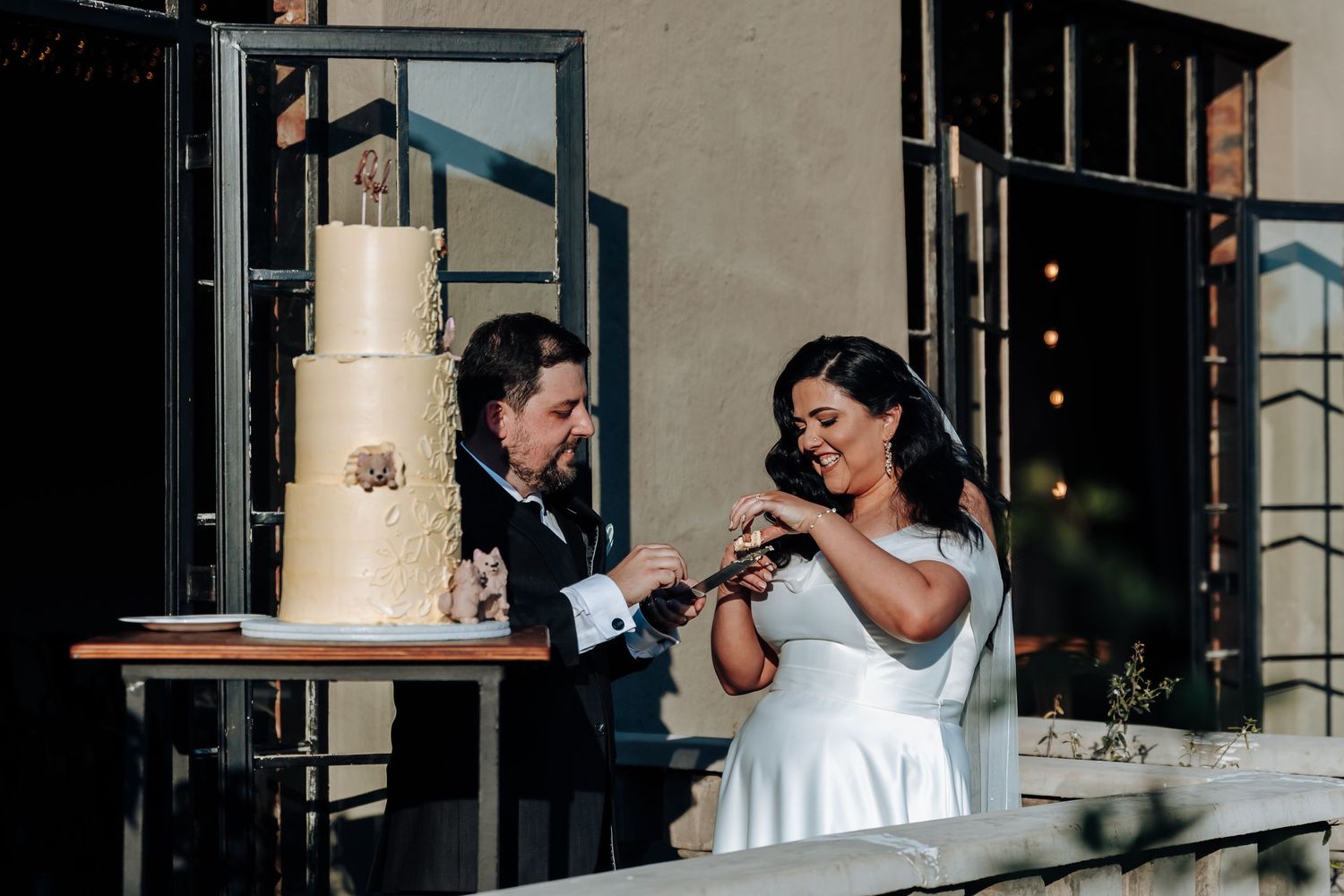 A romantic wedding photo sequence captured through an industrial window frame.