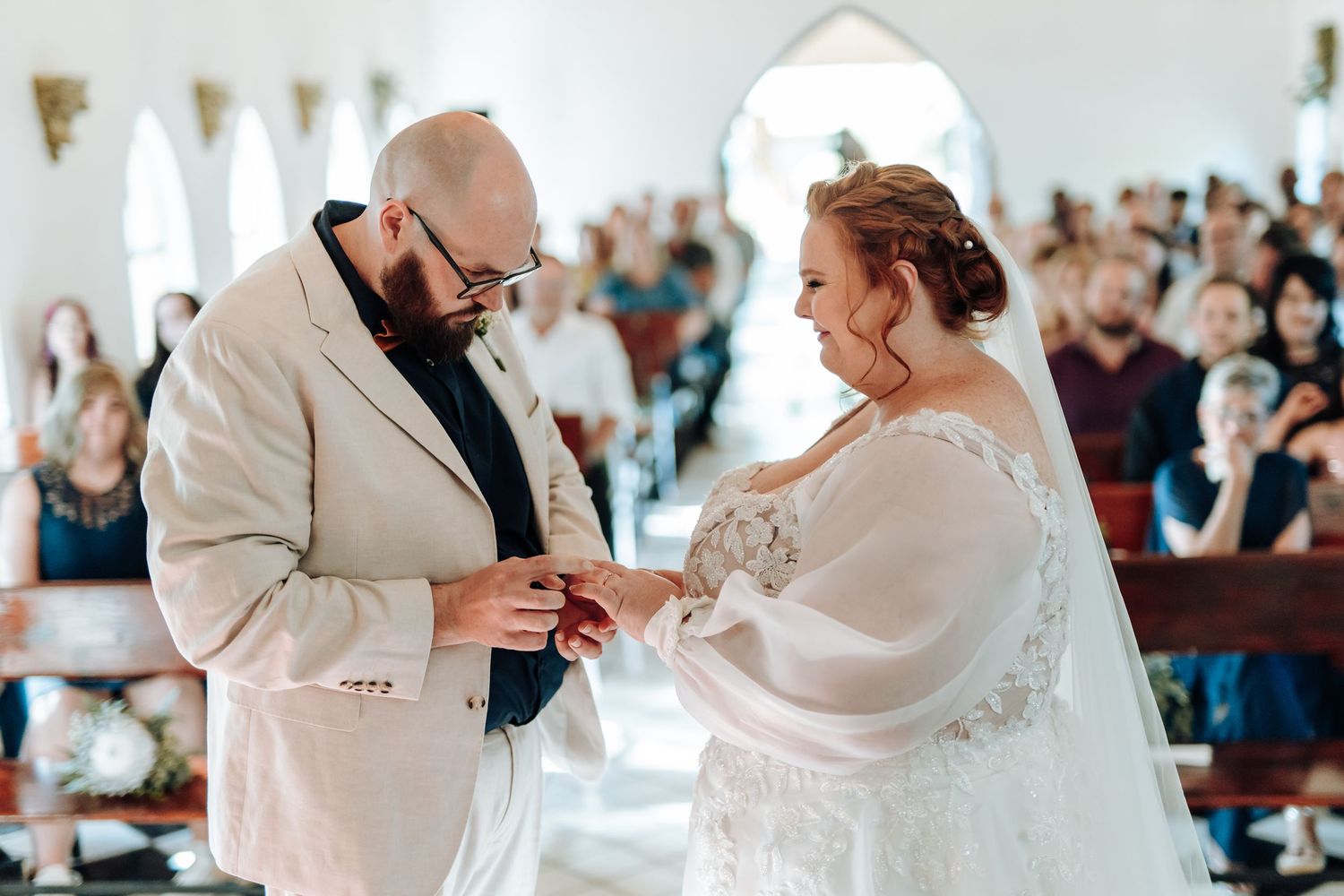 A wedding ceremony montage showing couples exchanging rings and vows in an elegant white setting.