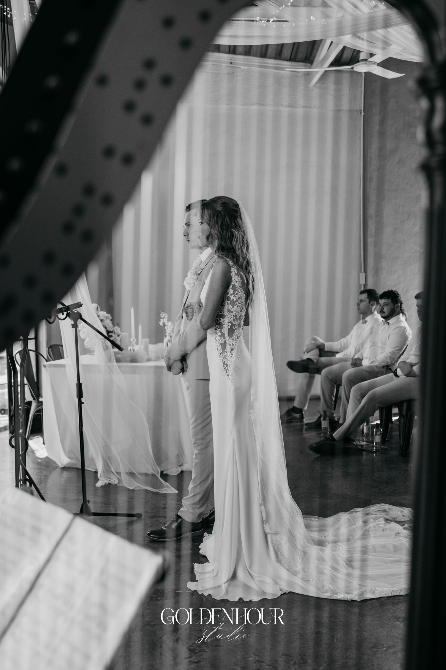 Black and white artistic wedding photography sequence showing preparations through window frames.