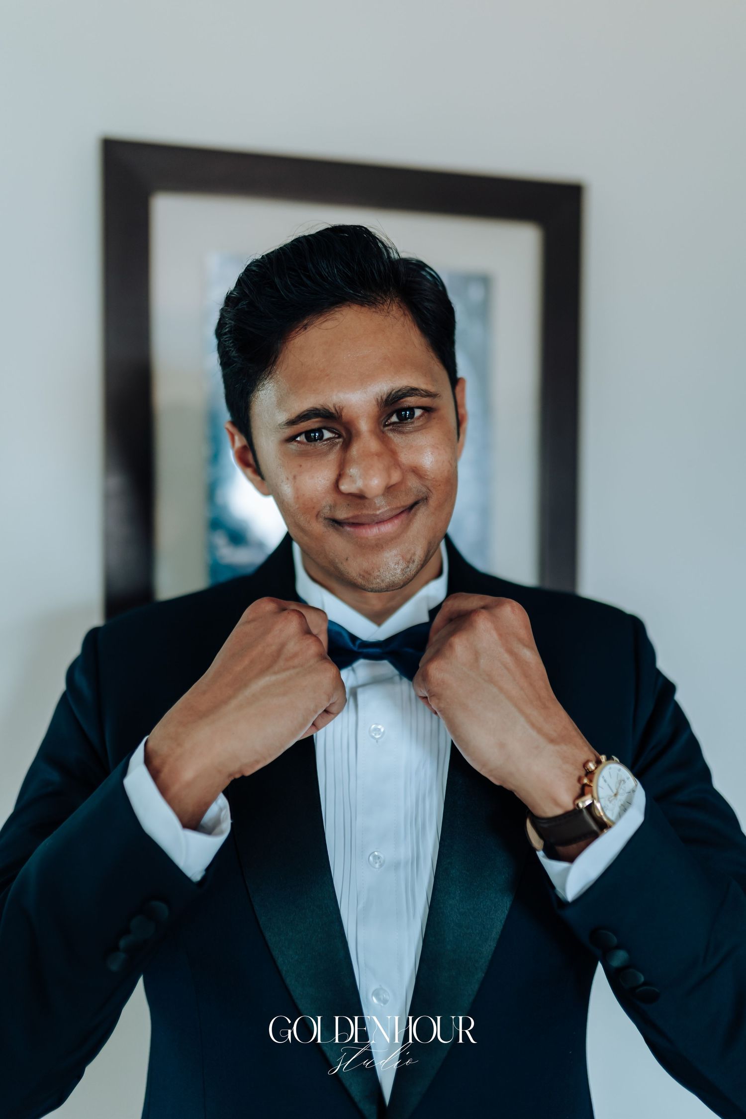 Formal attire with black tuxedo and bowtie for special occasion.
