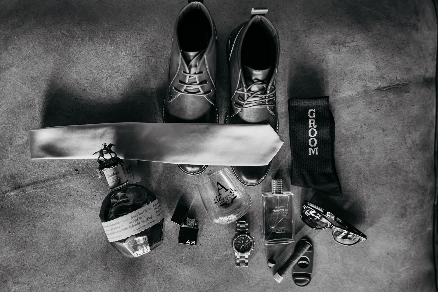 Artistic black and white composition of skateboarding tricks and motion sequences arranged in a filmstrip style layout.