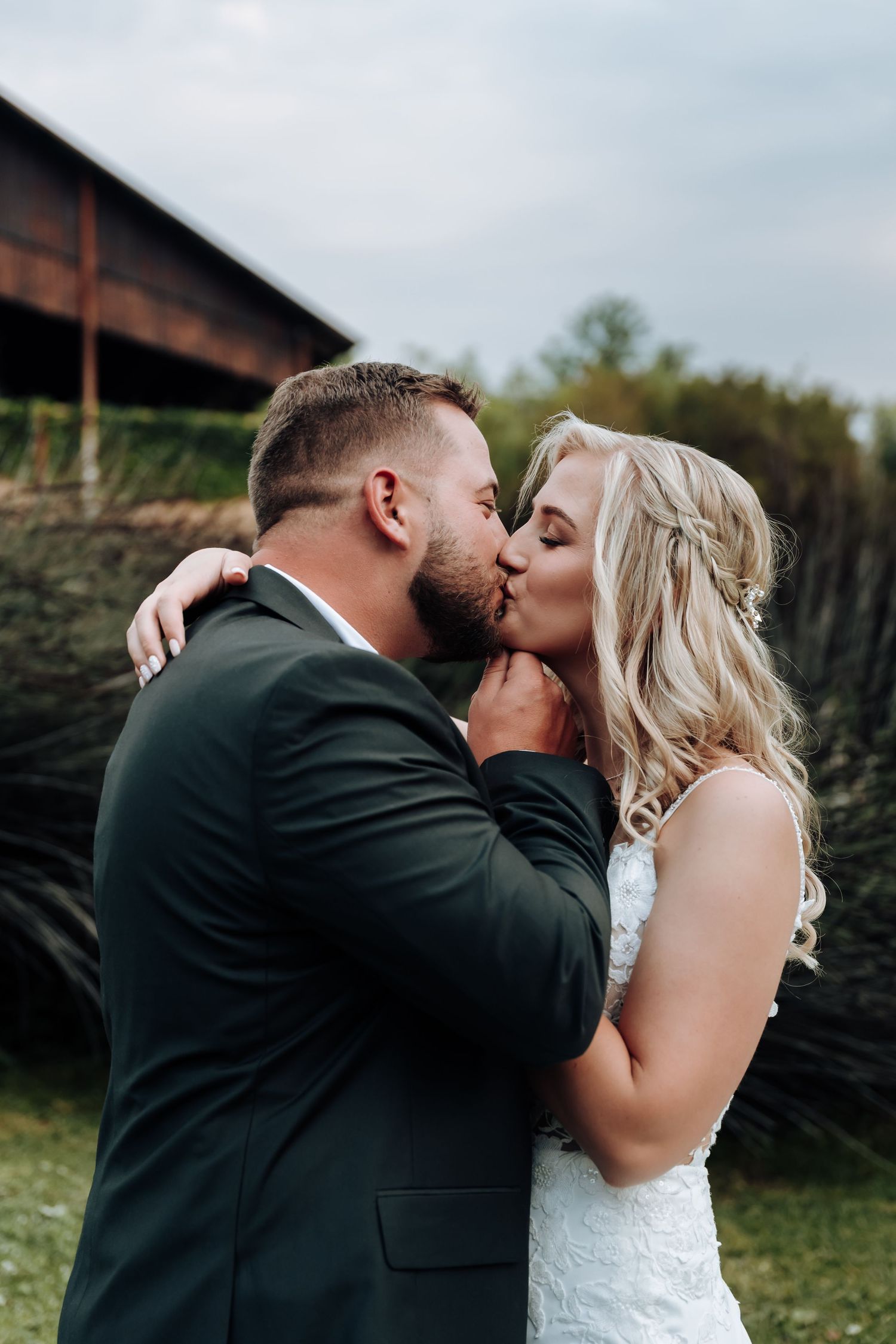 A romantic wedding photo sequence showing a couple sharing a kiss in a garden setting.