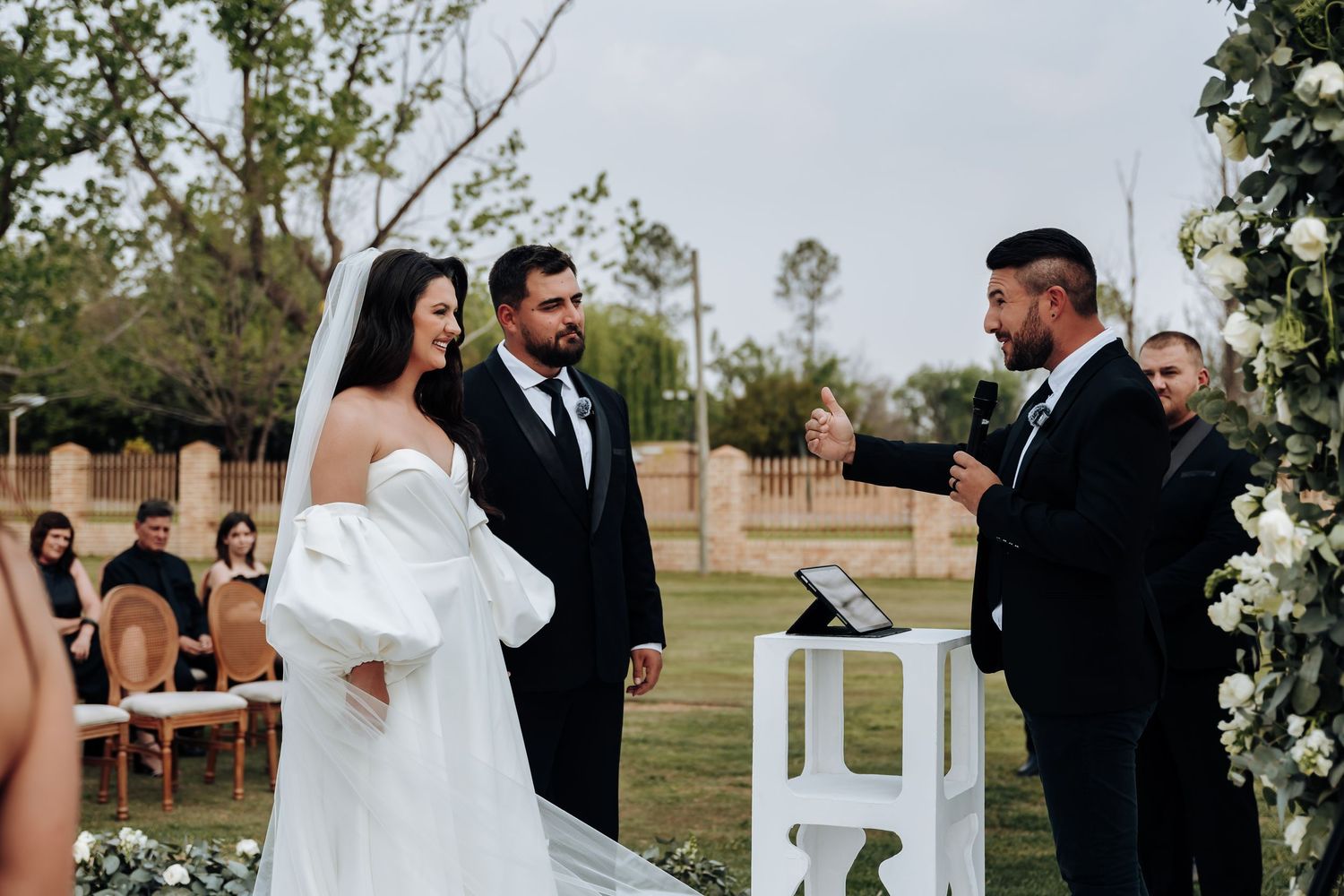 A wedding ceremony collage showing outdoor venue decorations, floral arrangements, and celebratory moments.
