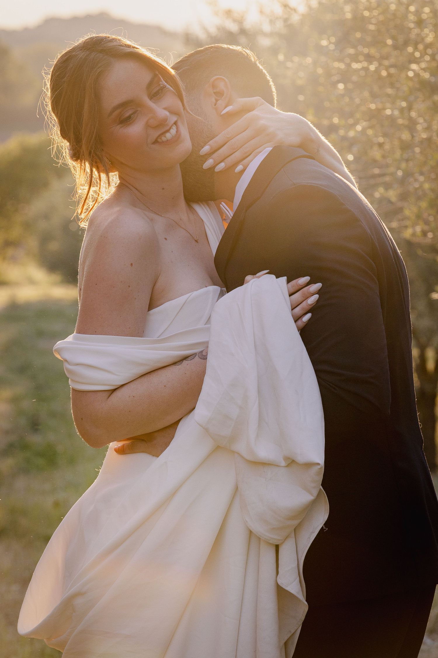 Romantic golden hour portrait session in an elegant white wedding gown.