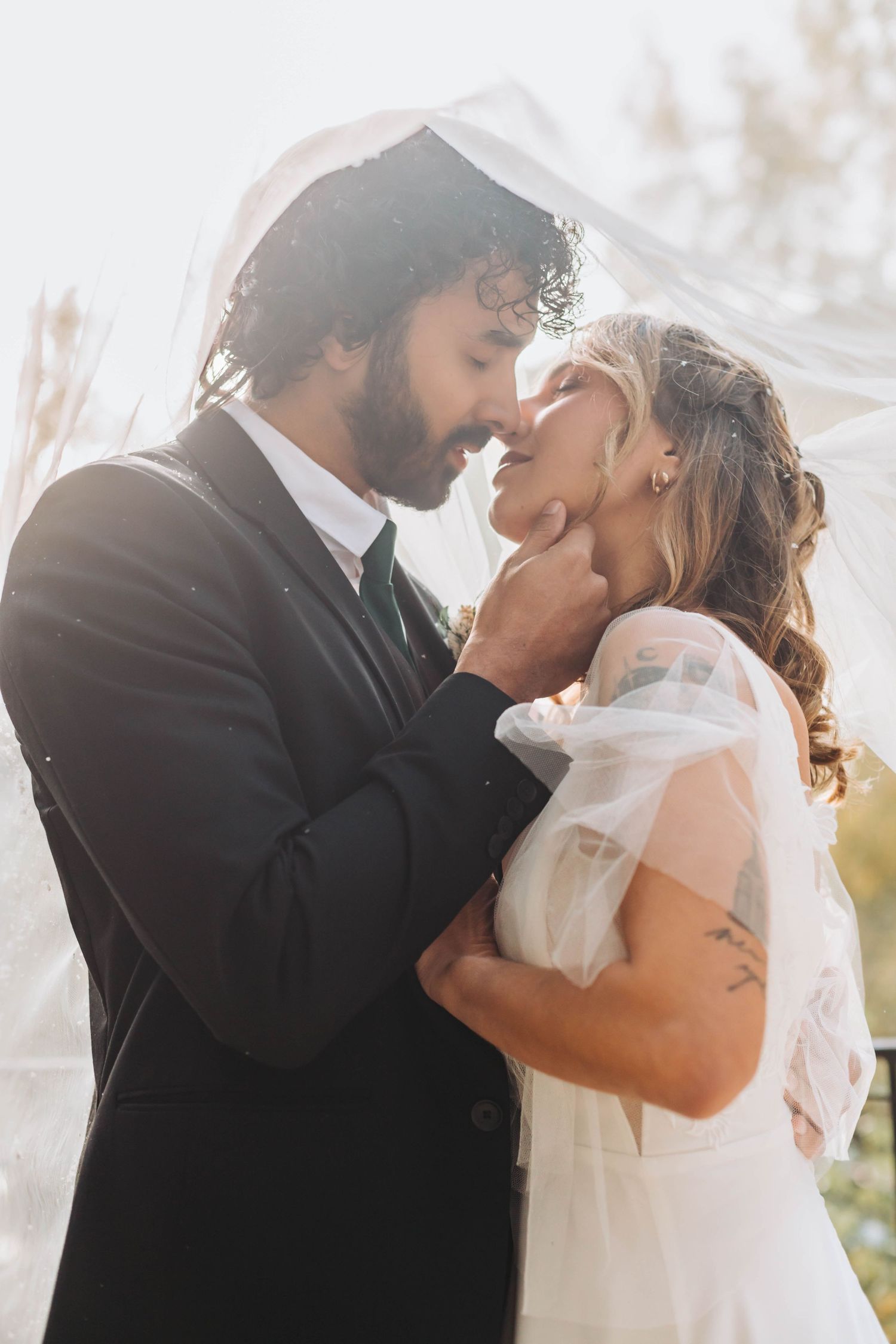 Artistic wedding photography sequence showing tender moments between newlyweds.