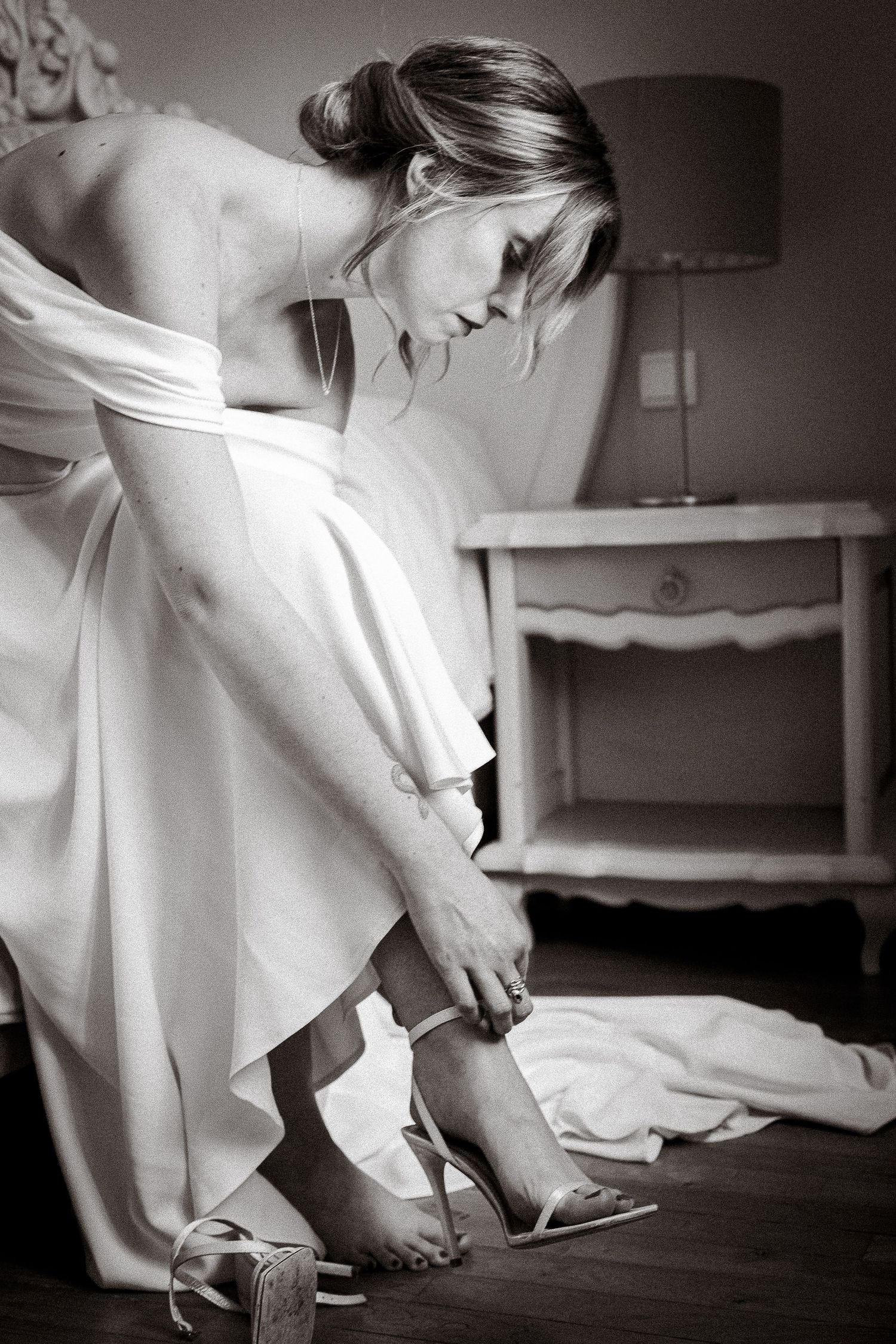 Black and white photo of wedding preparation details in minimalist style.