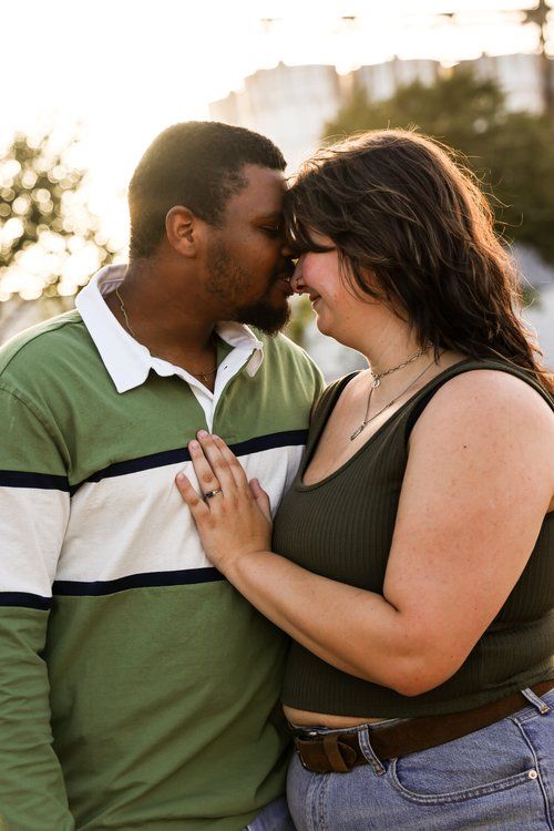 Intimate moment between couple during golden hour outdoor photoshoot in Abilene, Texas.