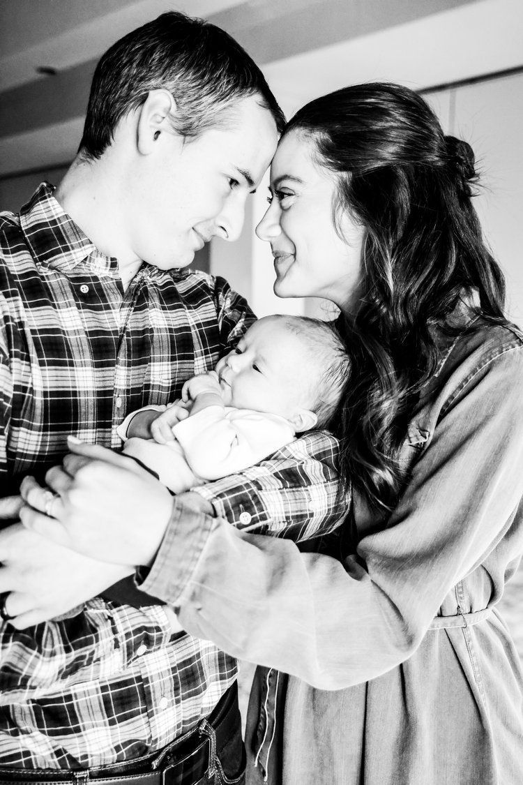 Black and white intimate family portrait with newborn baby in Abilene, Texas.
