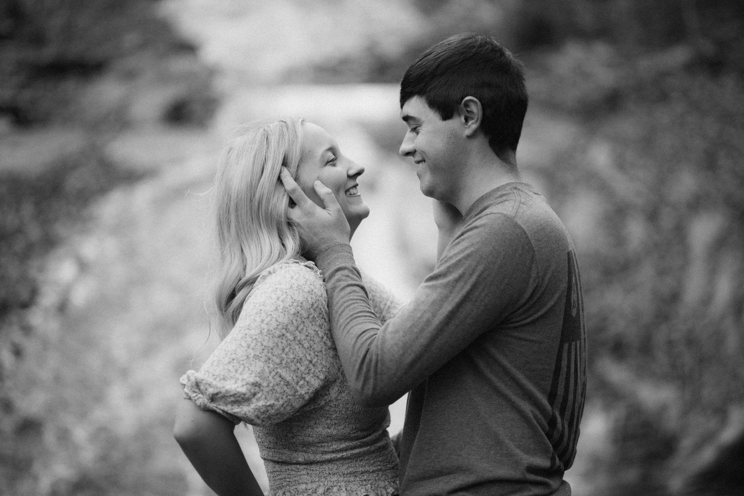 A romantic black and white portrait session capturing tender moments between a couple.