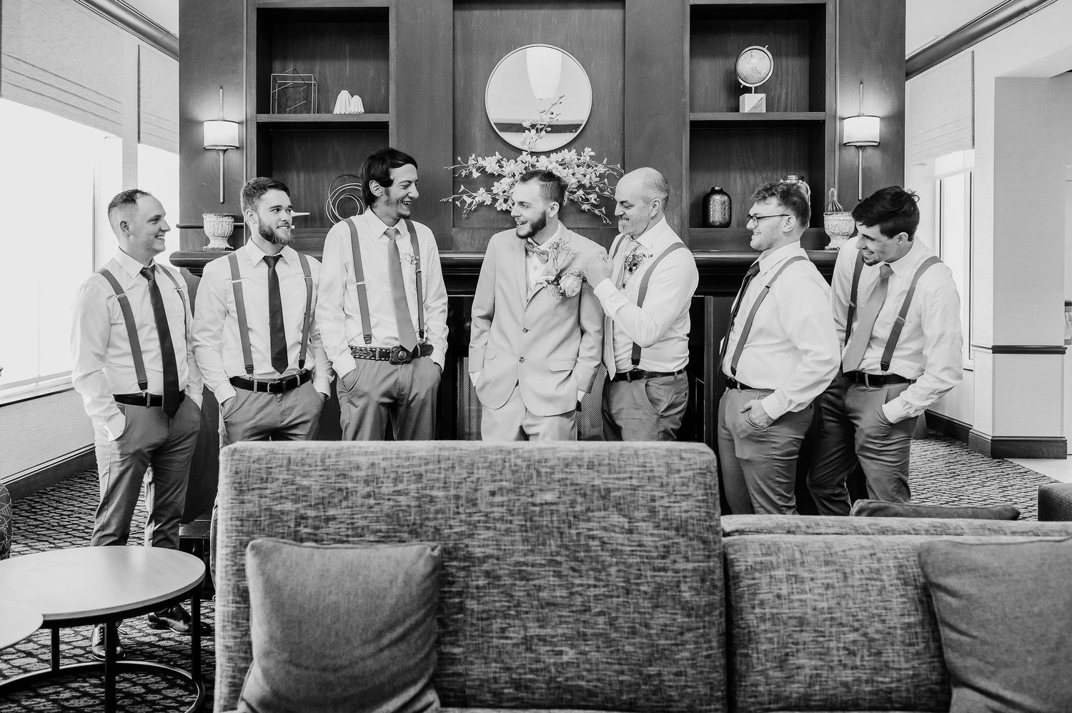 A series of vintage black and white office photos showing groups of people in professional settings from the 1950s or 1960s.