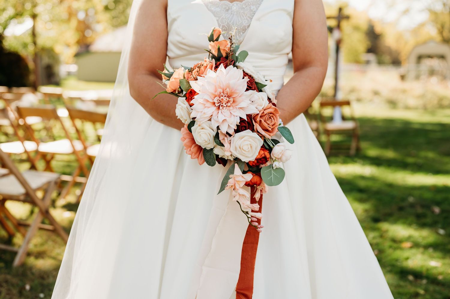 A row of wedding photos showing white dresses and coral-colored floral bouquets in an outdoor garden setting.