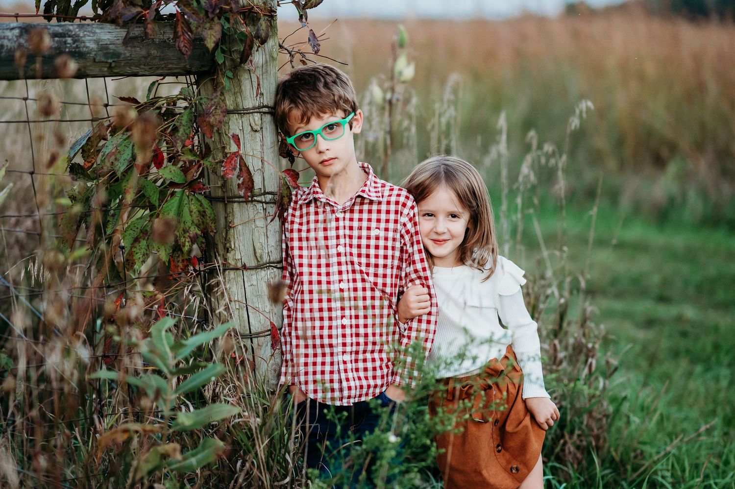 Natural light family photography session in a rustic outdoor setting with fall foliage at Prophetstown State Park in West Lafayette, Indiana