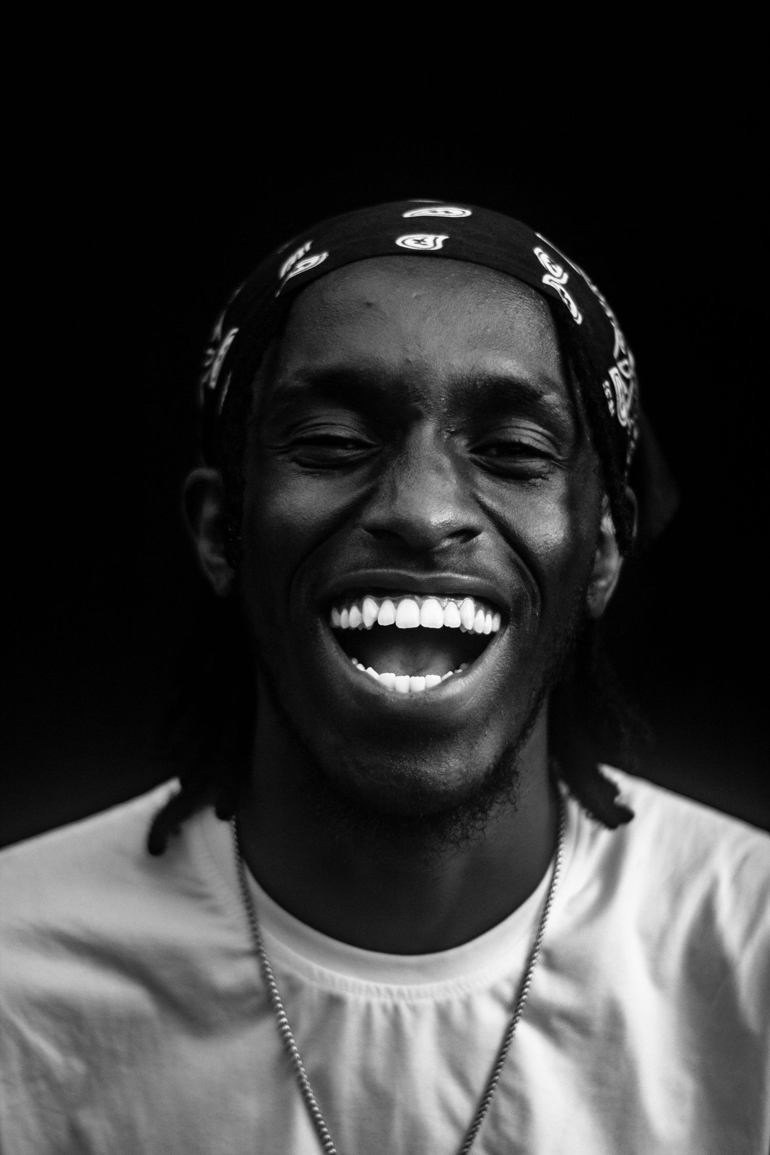 B/w portrait of a smiling young man
