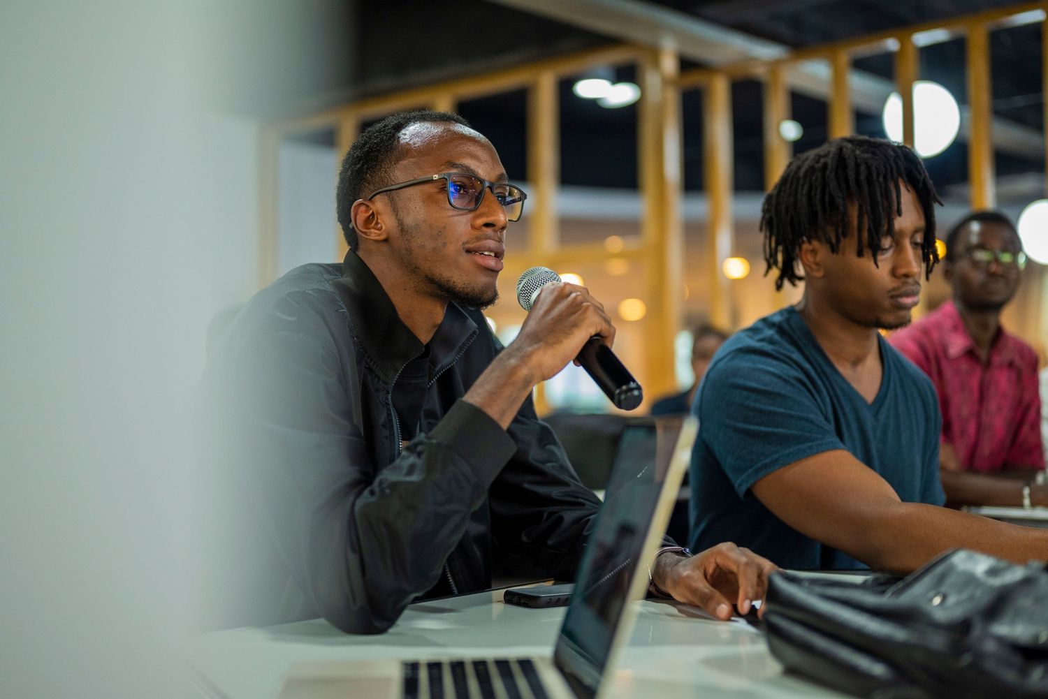 Young men in a meeting