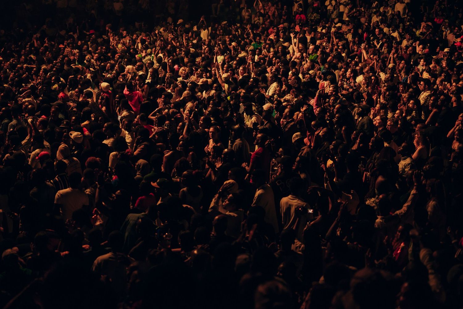 A lot of people enjoying a concert.