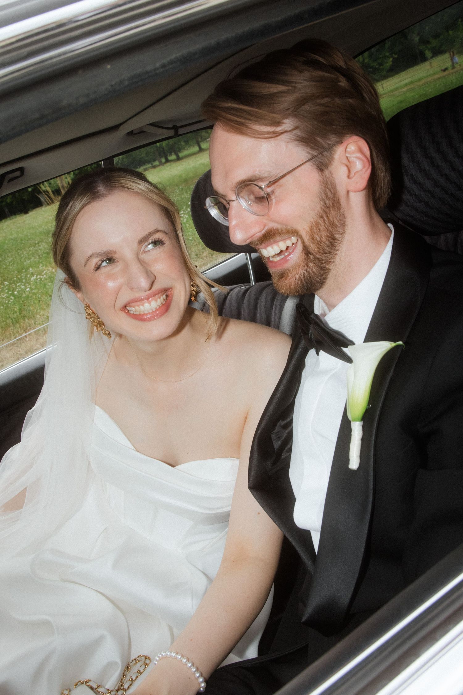A series of candid moments captured between newlyweds in their car.