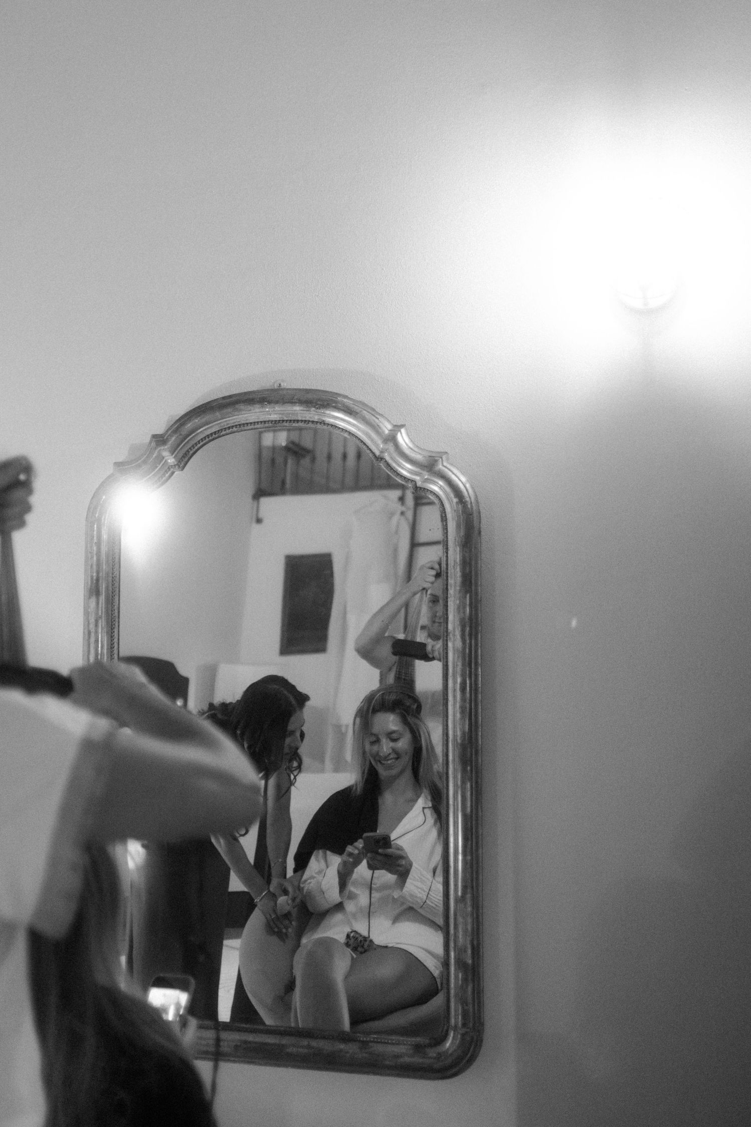 Series of mirror reflections in a vintage-style getting ready room.