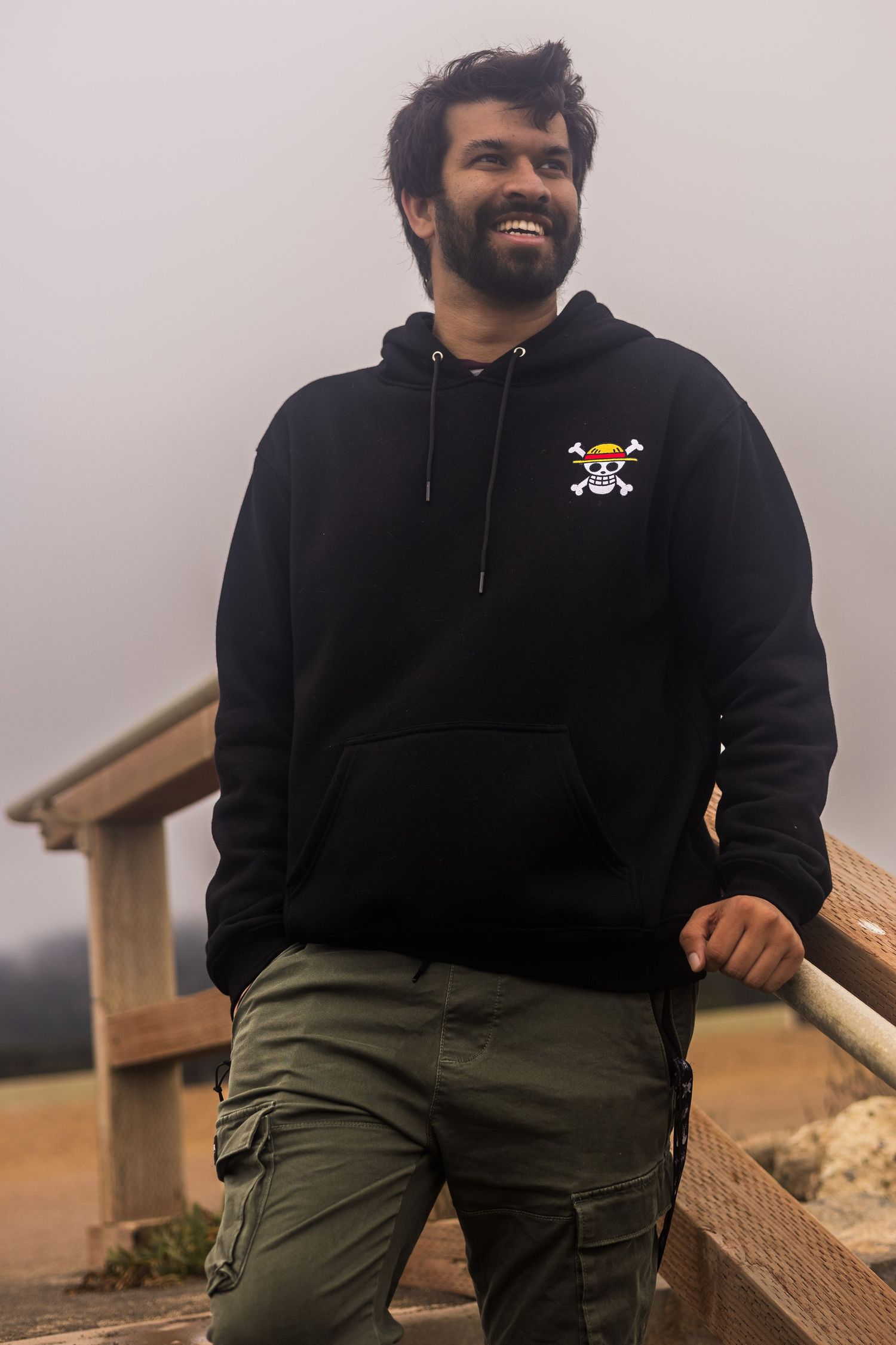 Outdoor portrait session at Pacifica Pier on a cloudy day.