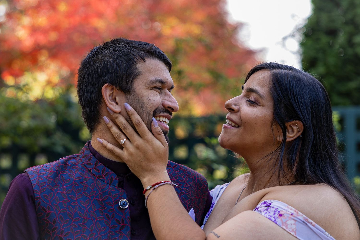 Loving couple with a bright orange natural background vibe,