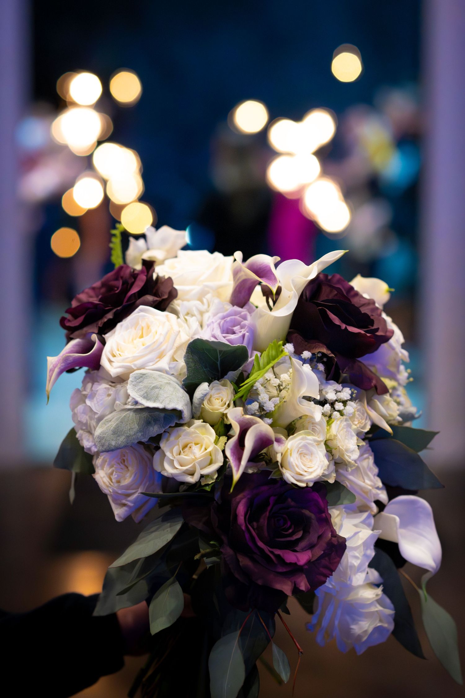 The bride's bouquet holds the ceremony in the present with the celebration of a Sparkler Send-Off dancing in the background. Connect today!