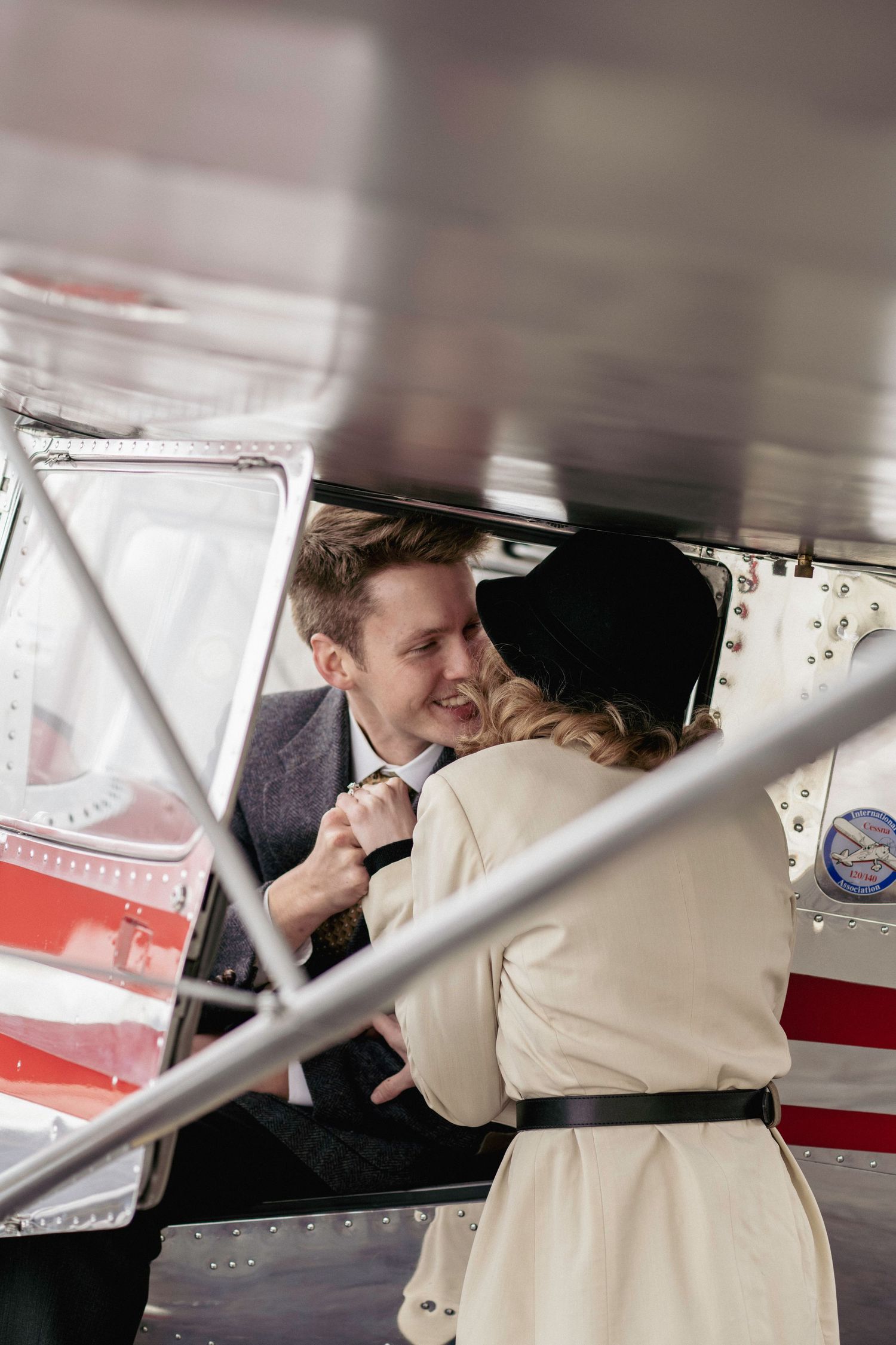 Vintage Cessna Aircraft used during a vintage engagement session. Connect with us today to plan your custom photography experience!