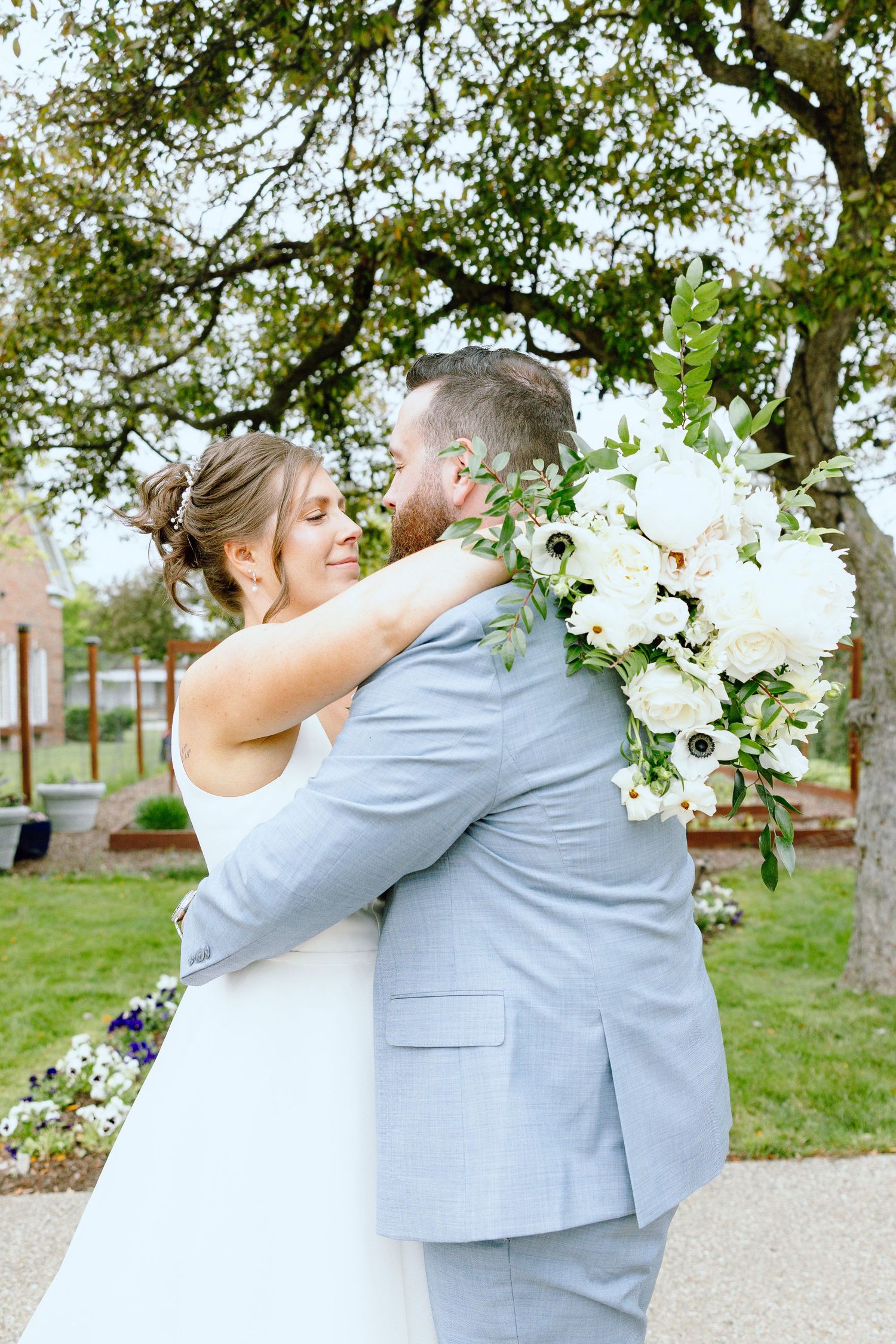 Married couple embracing at Great Lakes Culinary Center in Southfield, MI