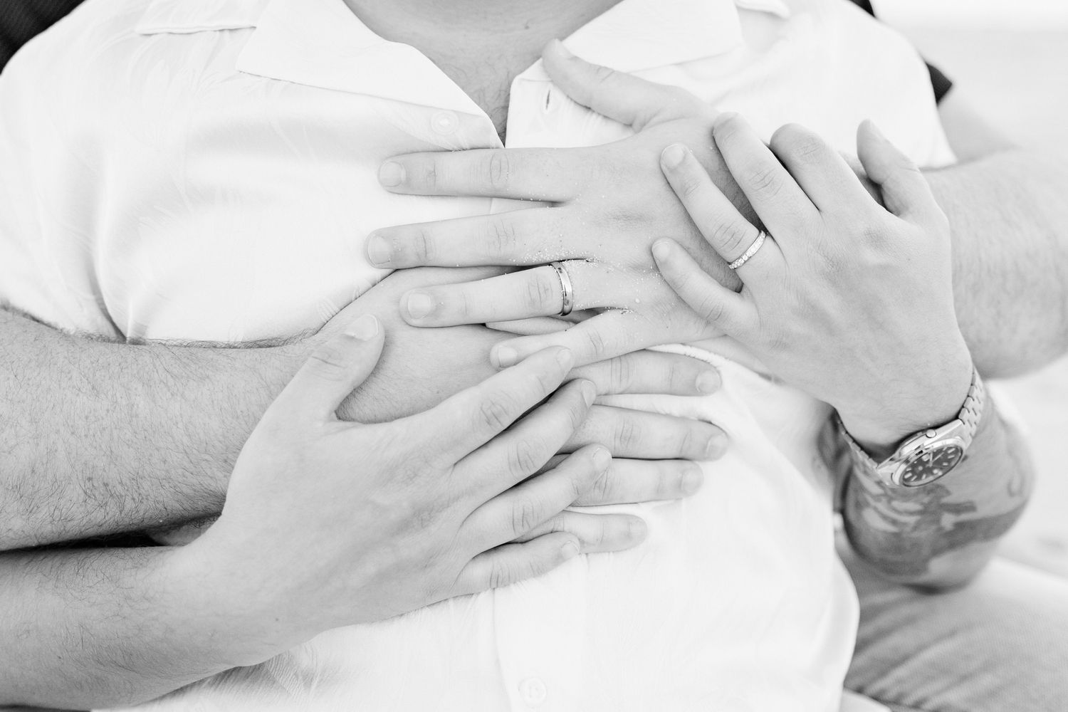 Detail photo of couple's hands and rings in North Miami Beach, Florida