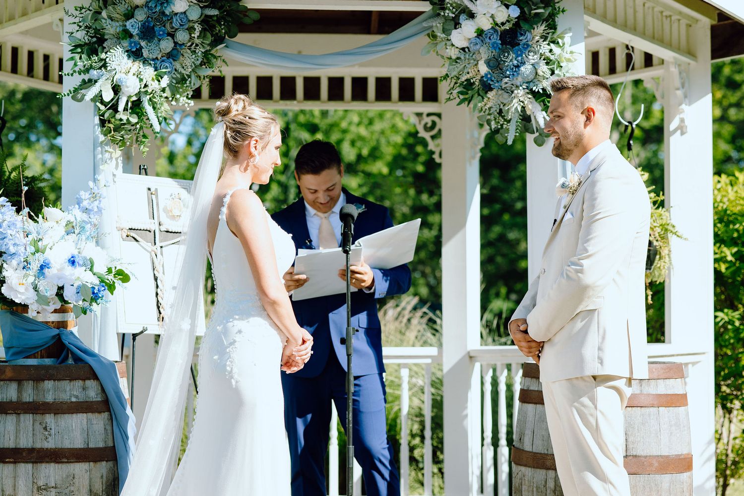 Couple exchanging rings at Lapeer Country Club wedding in Michigan