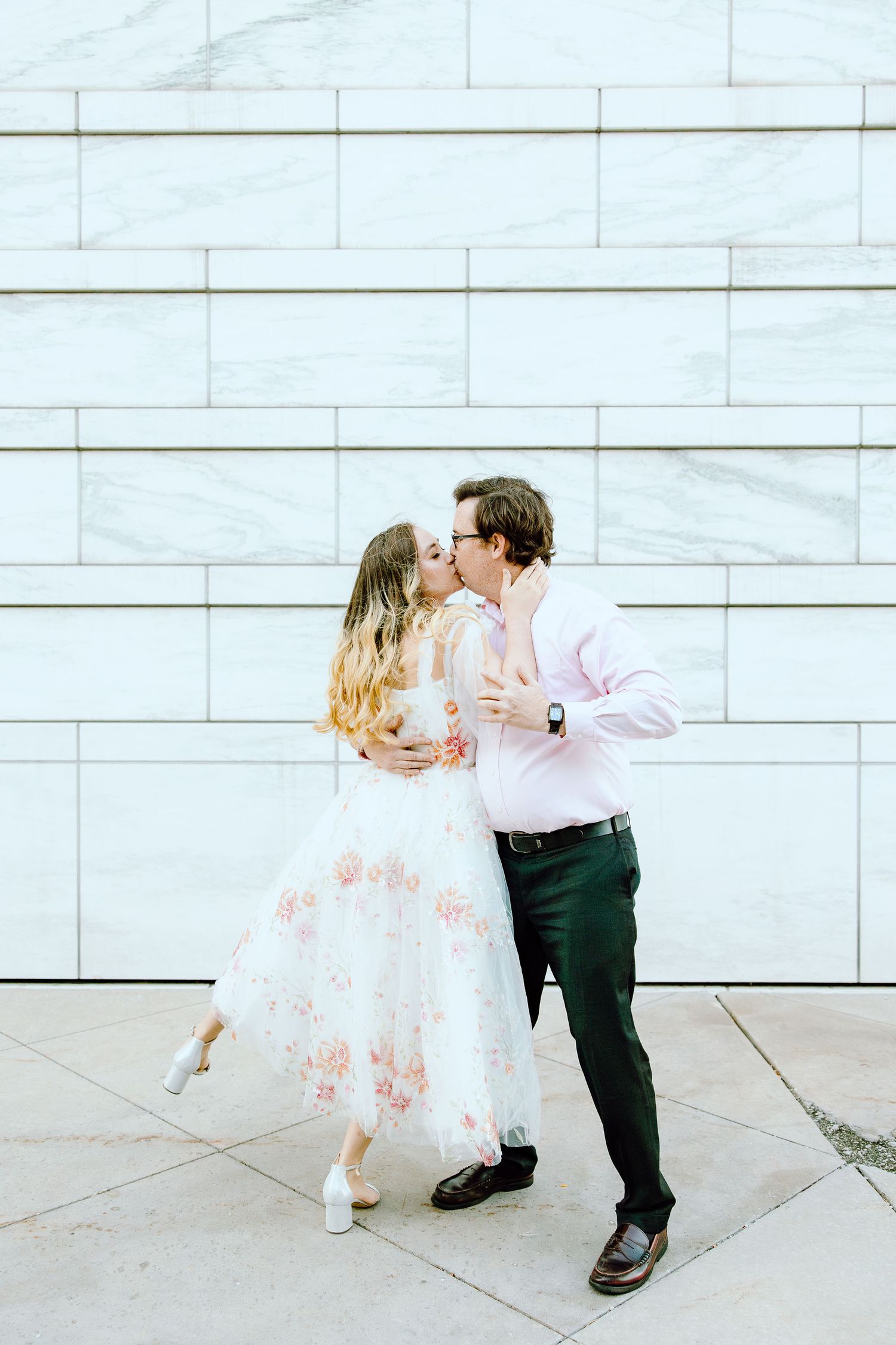 Engaged couple swing dancing at Detroit Institute of Arts engagement session in Detroit, MI