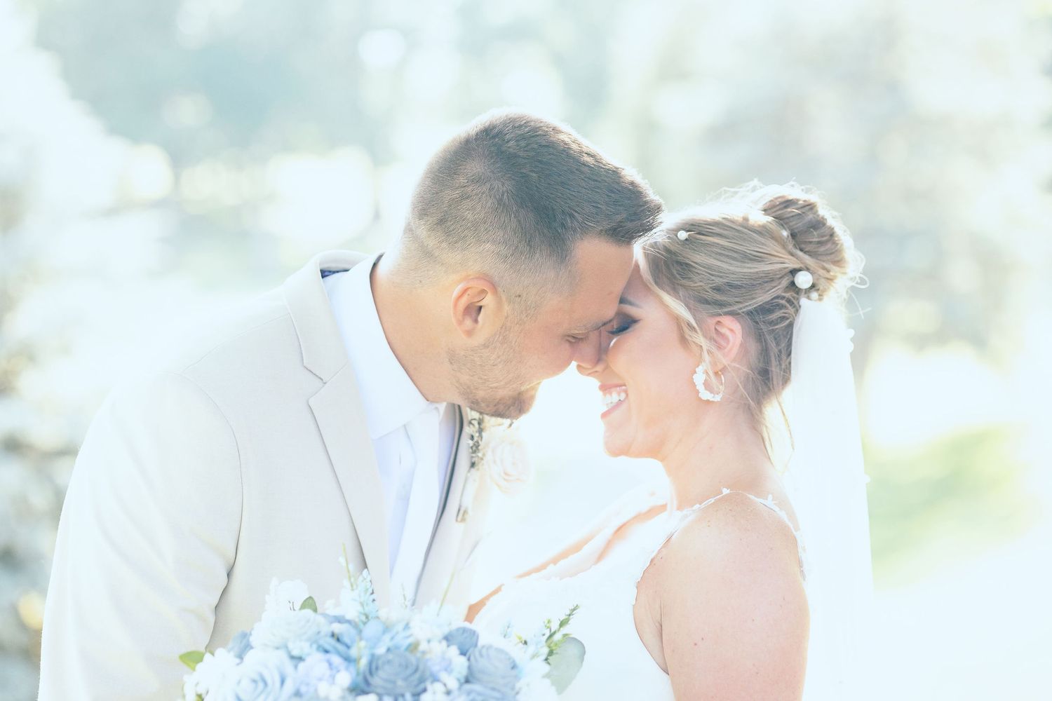 Married couple embracing at Lapeer Country Club wedding in Michigan
