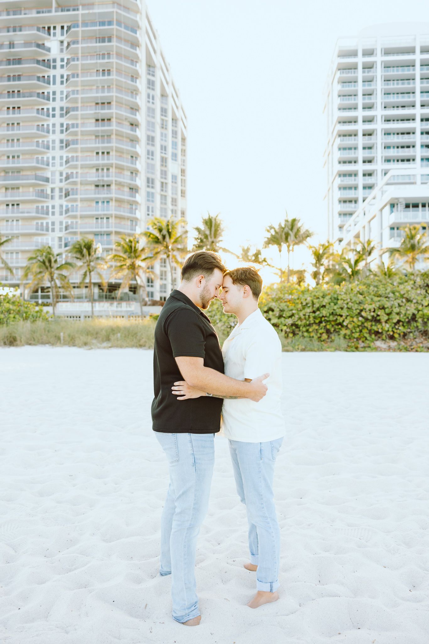 Gay couple touching foreheads at North Miami Beach in Florida