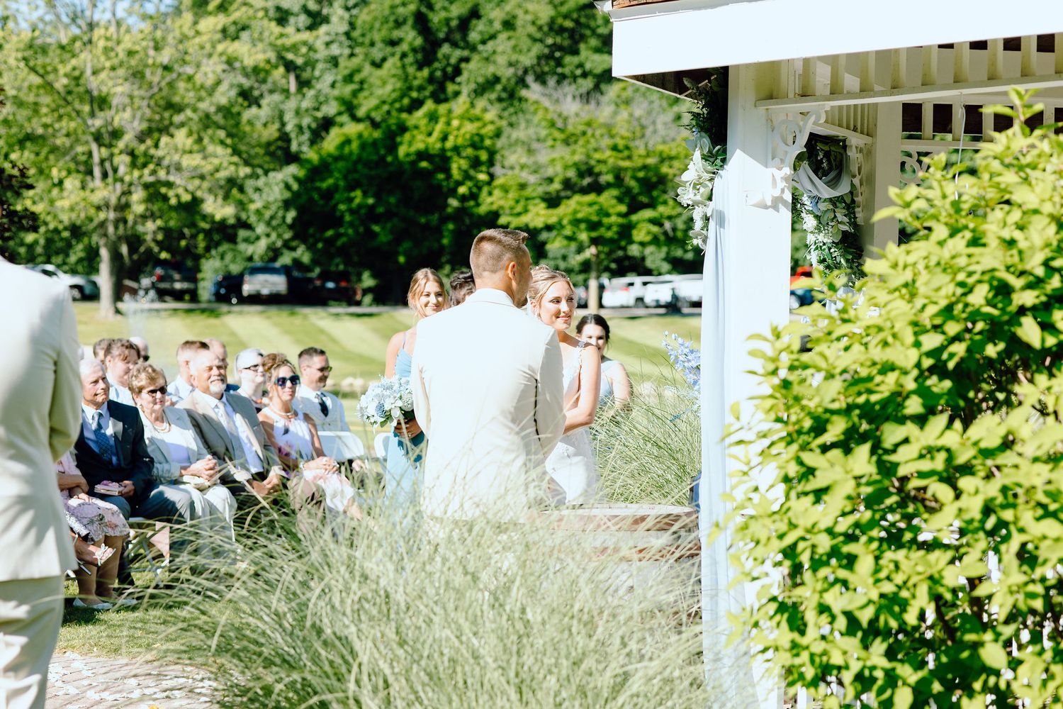 Wedding ceremony at Lapeer Country Club wedding in Michigan