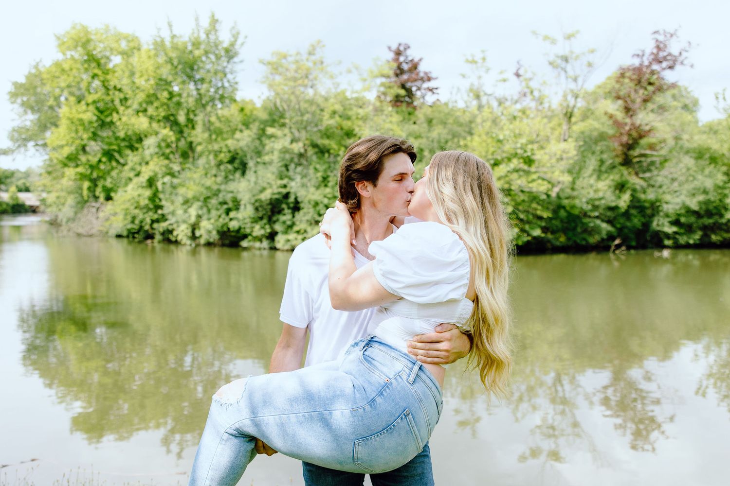 Man lifts his fiancé at Greenfield Village in Dearborn, MI