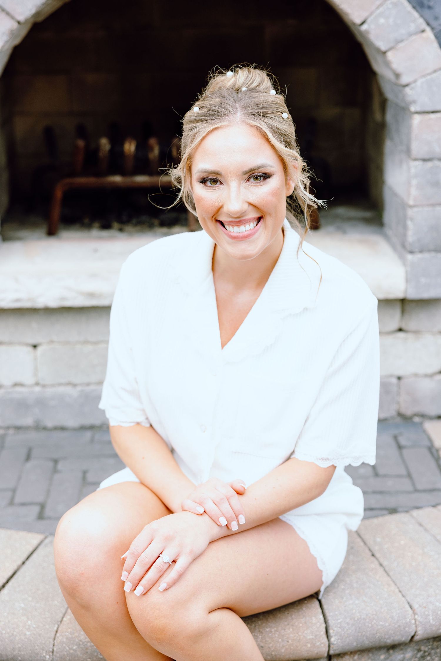 Bride in getting ready pajamas at Lapeer Country Club wedding in Michigan