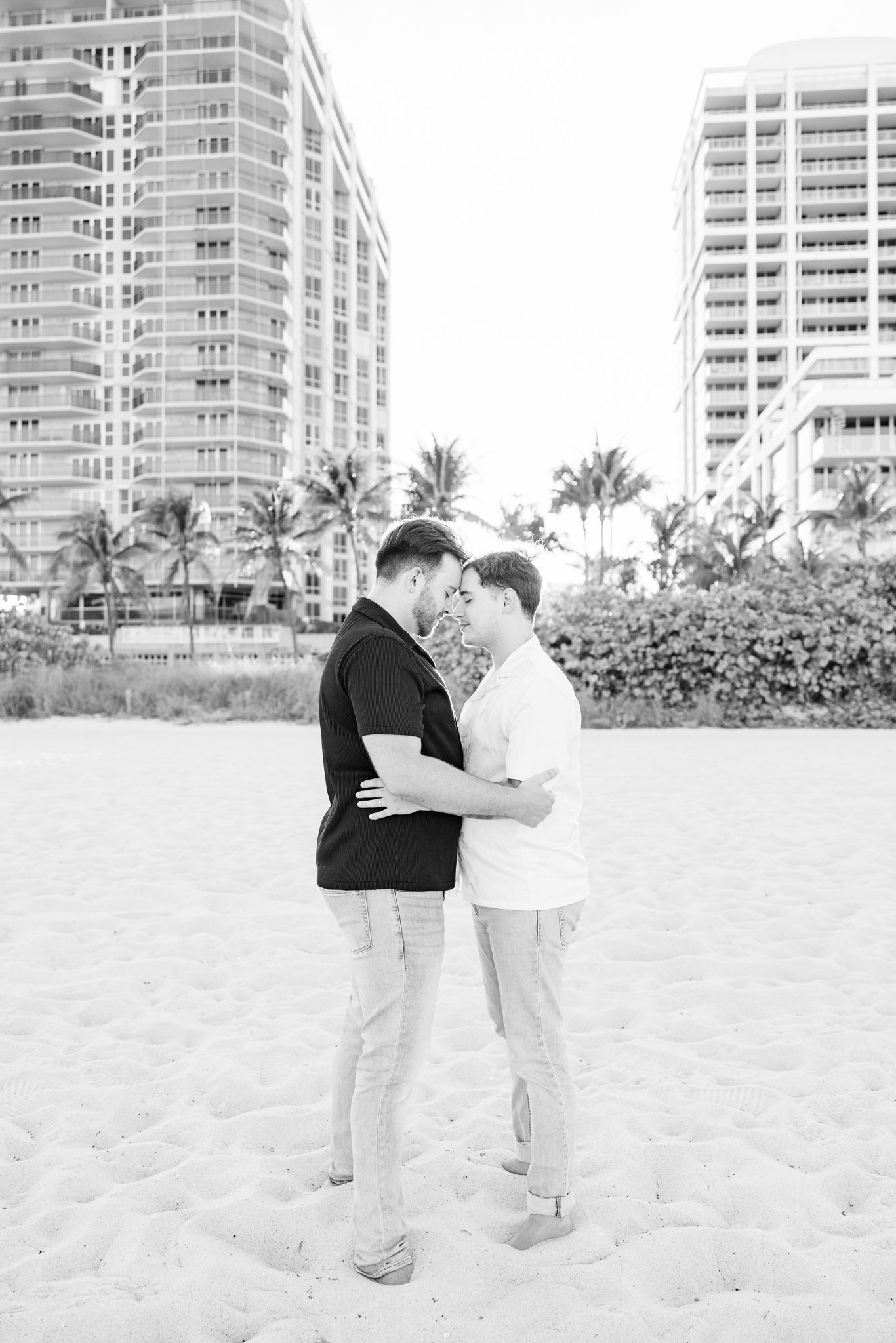 Gay couple touching foreheads at North Miami Beach in Florida