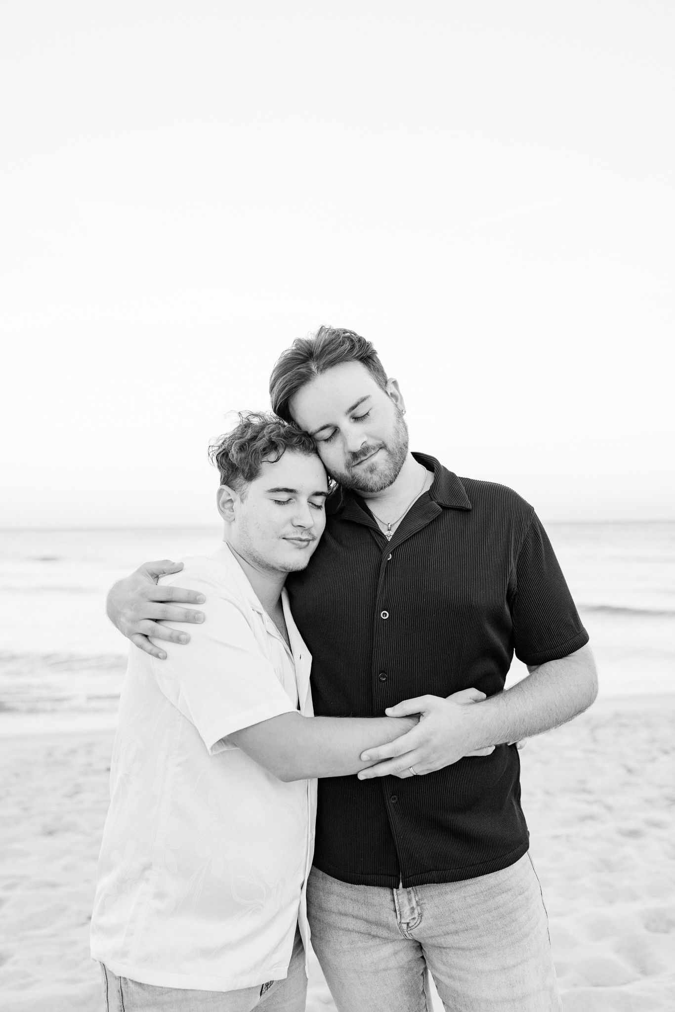 Gay couple embracing at North Miami Beach in Florida