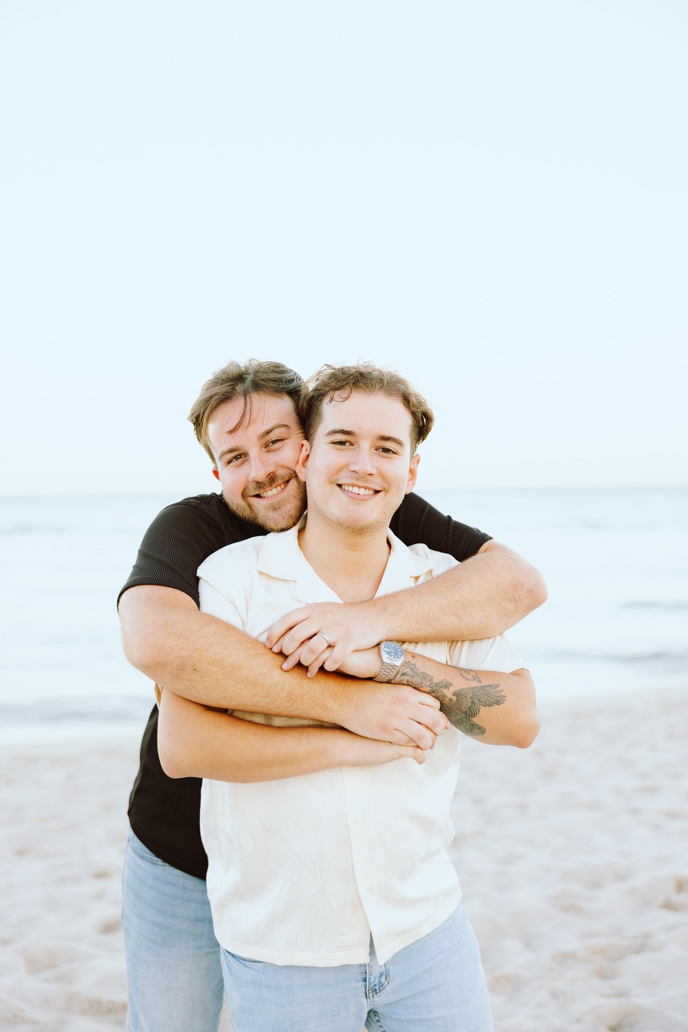 Gay couple embracing at North Miami Beach in Florida